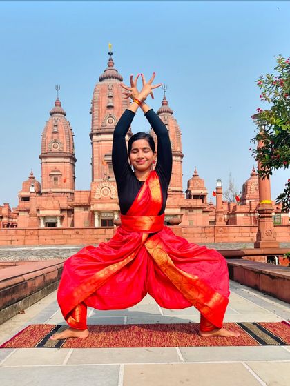 Channeling the energy of the divine with Devi Asana (Goddess Pose) at the temple. This pose grounds you and connects you to your inner shakti.