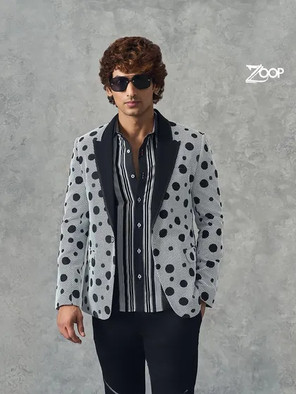 A versatile and stylish polka-dot blazer, perfect for the modern trendsetter who wants to stand out.
