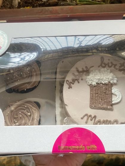 Can't decide between a cake and cupcakes? Get both. This combo features a bento cake with a cute beer mug design and two matching chocolate cupcakes.