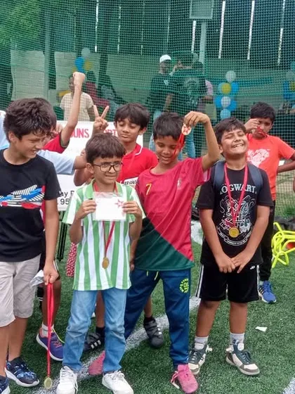 That winning feeling! After an epic football tournament, it's all smiles and celebrations. We make sure every child feels like an MVP with fun competitions and awards that boost their confidence.