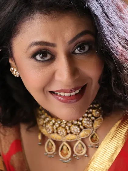 For clients who want that cinematic, 'filmy' look, I create scenes that feel like they're straight out of a movie. This shot with actress Kashish Duggal captures that classic Bollywood glamour with rich colors and expressive lighting.