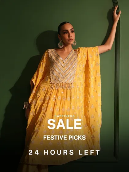 Your urgent reminder that the Happiness Sale is on. This vibrant yellow kaftan is one of my top festive picks, and it’s flying off the shelves. It’s comfy enough for all day wear but chic enough for any party.