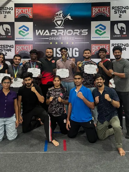 The team celebrating a massive haul of medals and certificates at the Warrior's Dream Series. This is the result of countless hours of grinding in the gym.