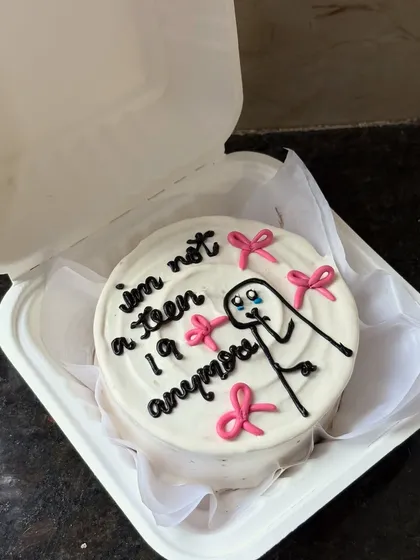 Another view of the "I'm not a teen anymore" bento cake, perfect for celebrating that 20th birthday milestone.