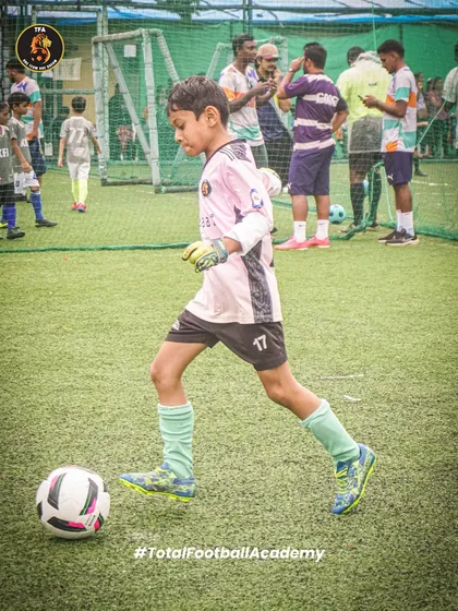 A young goalkeeper practicing his footwork, an essential skill for modern keepers.