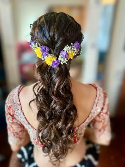 Another angle of the messy floral ponytail, showing the beautiful blend of colors and textures.