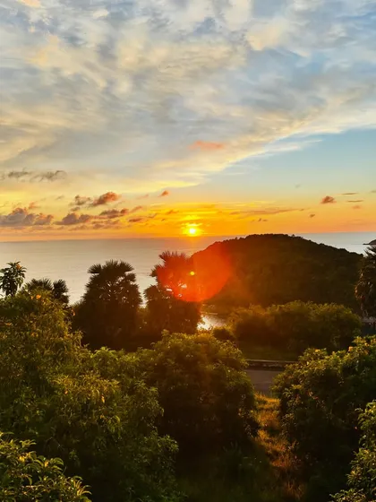 Taking in a breathtaking sunset in Thailand. Travel and experiencing the beauty of the world is a huge part of my life, reminding me to stay present and grateful.