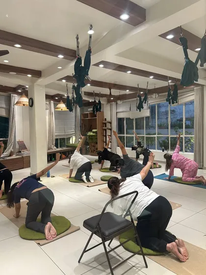 A full class using various props like chairs and wheels to modify and enhance their practice. This demonstrates our philosophy that yoga is adaptable for every individual.
