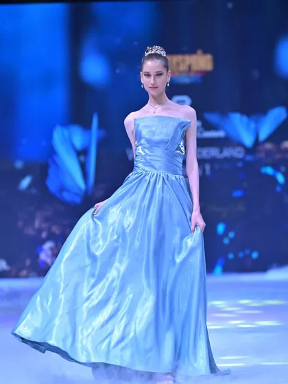 A classic A-line silhouette in shimmering satin. This ethereal blue gown from my GULFAM collection features a structured off-shoulder bodice for a look of timeless grace.