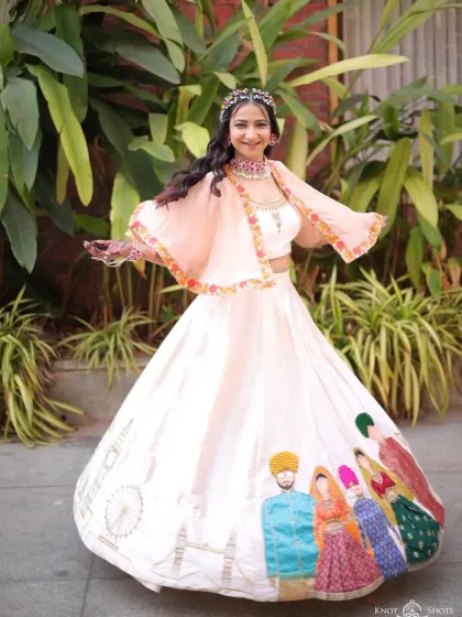 A joyful, full-length shot of the bride in her custom Haldi outfit. The entire look is a celebration of her personal story.