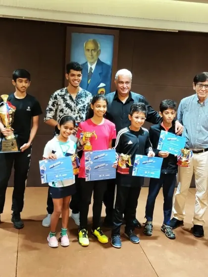 A group of our young winners from the CCI Greater Mumbai District Badminton tournament posing with their trophies and certificates.
