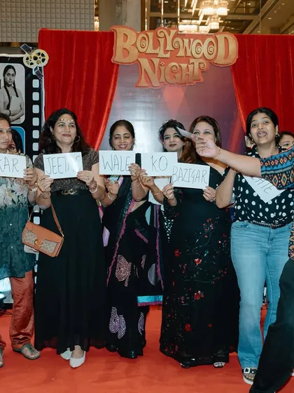 Another fun moment from our Bollywood game night. These simple, interactive props got everyone laughing and participating, helping to build camaraderie and create lasting memories for the team.