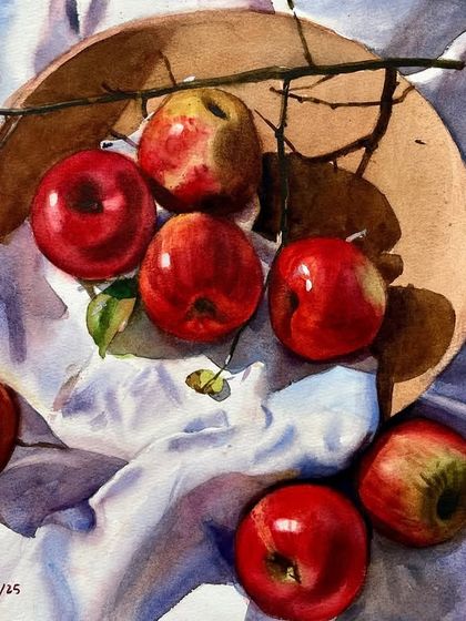 This still life of apples in a bowl is from my ongoing watercolor course. The strong overhead light creates dramatic shadows, which helps to define the form of the apples and the cloth.