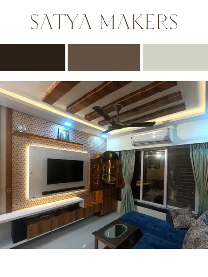 A living room design concept with wooden ceiling beams and a blue sofa.