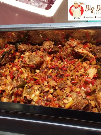 Meet our Iga Pedas, or Lightning Ribs! They are super spicy and full of flavor. We cook them all day in a big pot right at our stall.