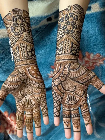 A beautiful design without any figures. This pattern focuses on the beauty of traditional motifs like florals, paisleys, and lotuses, expertly arranged.