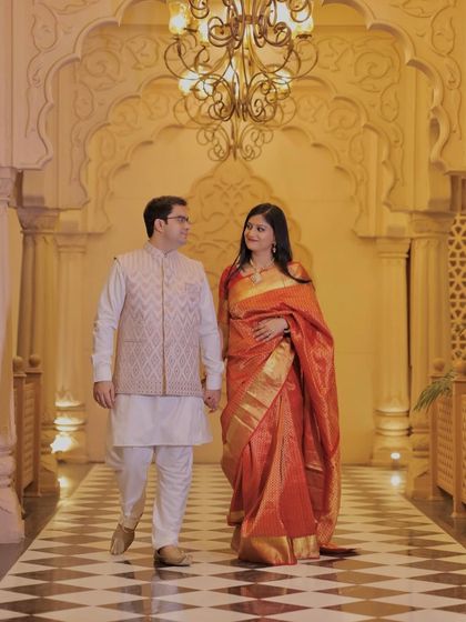 A beautiful shot in a traditional saree. The makeup is classic and elegant, with a focus on glowing skin and a defined lip.