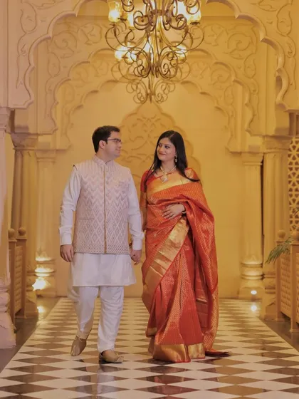 A beautiful shot in a traditional saree. The makeup is classic and elegant, with a focus on glowing skin and a defined lip.