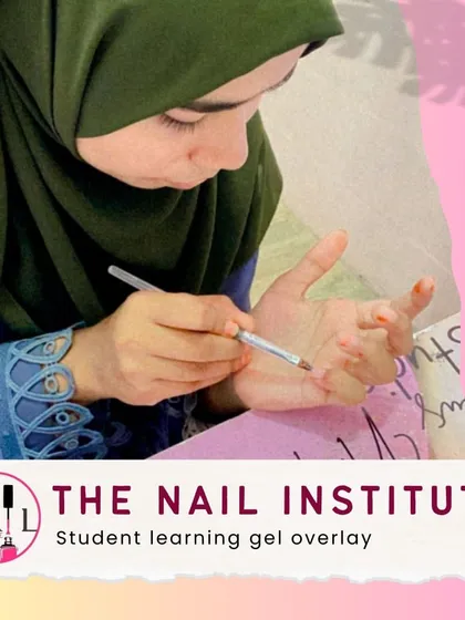 This student is learning how to apply a gel overlay, a technique that adds strength to natural nails without adding length.