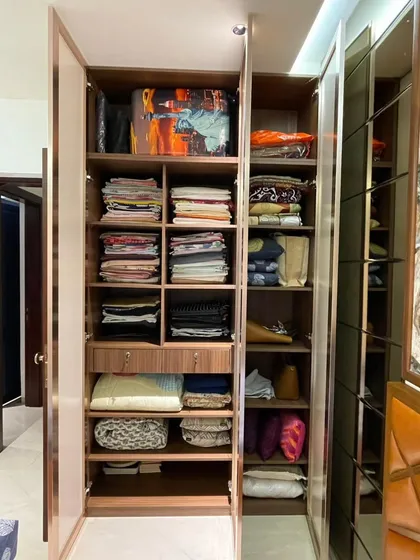 Opening the doors reveals the true intelligence of the design: a fully customized interior with smart storage solutions. We've included a variety of shelves and compartments for folded clothes, bags, and accessories, making organization effortless.