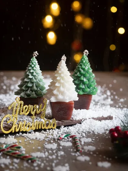 I wanted to capture the magic of a white Christmas with this scene. These are my bestselling Christmas tree candles, set in a snowy landscape with festive candy canes. They are perfect for creating a cozy holiday atmosphere in your home.
