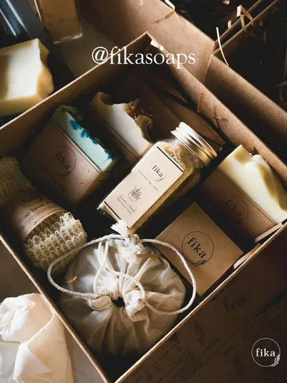 Here is another one of my unique, curated gift sets. This box features a selection of artisan soaps, a soap saver pouch, bath salts, and other small-batch items, all nestled in kraft paper shred for sustainable and beautiful presentation.