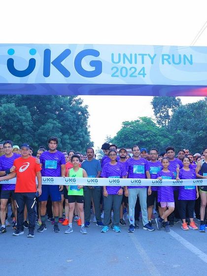 The start line of the UKG Unity Run 2024, packed with enthusiastic runners ready to take on the course in Noida.