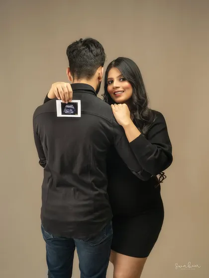 The very first family photo. Incorporating the ultrasound picture is a sweet and creative way to include your little one in the portrait before they even arrive.