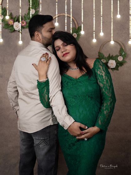 A quiet, intimate moment under soft, romantic lighting. This pose is perfect for capturing the deep connection between partners.