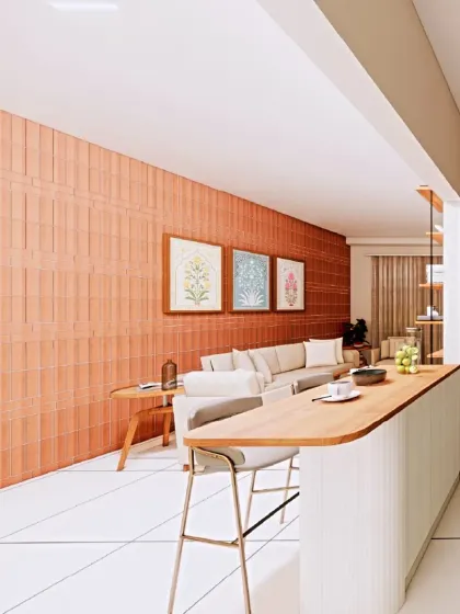 The breakfast bar serves as a clever transition between the kitchen and the living area. It provides a casual dining spot while keeping the kitchen partially open, maintaining a sense of connection.