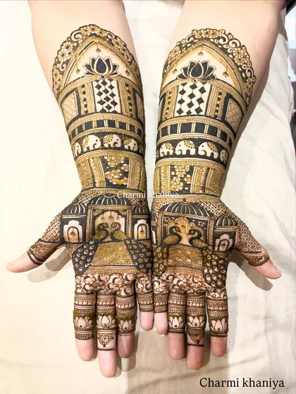 A perfectly symmetrical design for the bride who loves classic beauty. This mehendi features royal jharokhas, proud peacocks, and lines of elephants, all balanced with delicate lotus motifs for a truly majestic look.