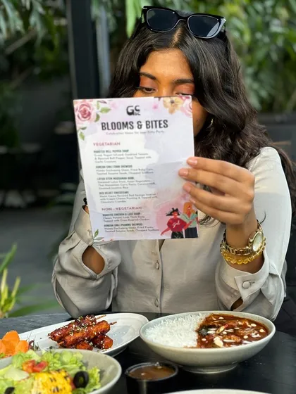 A guest enjoying our 'Blooms & Bites' menu. I created this special offering to make ladies' gatherings even more memorable.