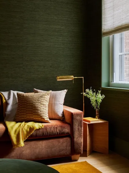 Another view of the Gold Coast Silk wallcovering, demonstrating how it creates a chic and simple space. The texture of the silk provides depth and sophistication without overwhelming the room.