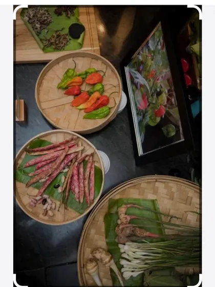 A display of some of the fresh, organic ingredients we use, including fiery Bhut Jolokia (king chillies), long beans, and aromatic ginger and galangal.