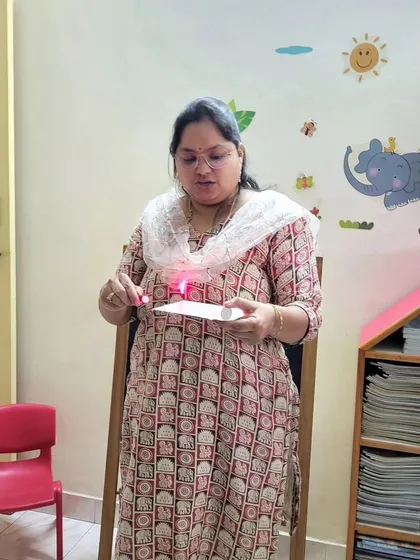 Here I am demonstrating an experiment involving light and energy. I believe in showing, not just telling, to make complex science topics easy to understand.