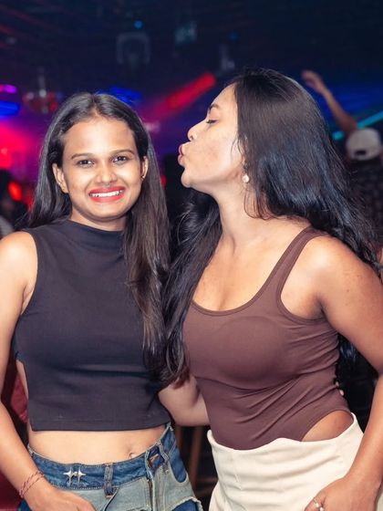 Friends making memories on the dance floor at Nolimmits. My goal is to create a soundtrack for your best nights out.