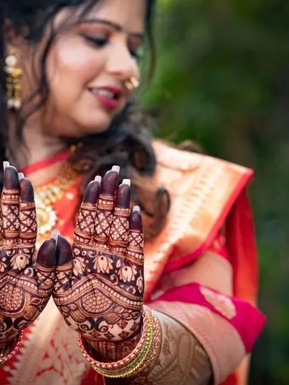 Looking at henna with a dark stain is a source of joy. My engagement bride Ruchi, showing off her beautifully stained hands.