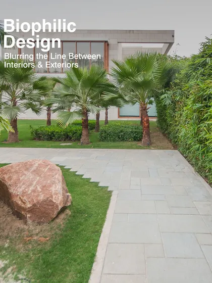Biophilic design is about blurring the line between indoors and outdoors. We use landscaping, natural materials, and views of nature to create spaces that connect occupants to their environment, promoting well-being.