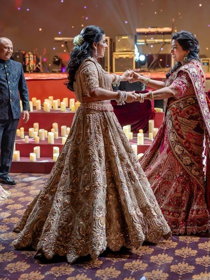 The bride shares a special dance with her mother and father. We choreograph these family moments to be emotional and meaningful, creating a lasting memory for everyone.