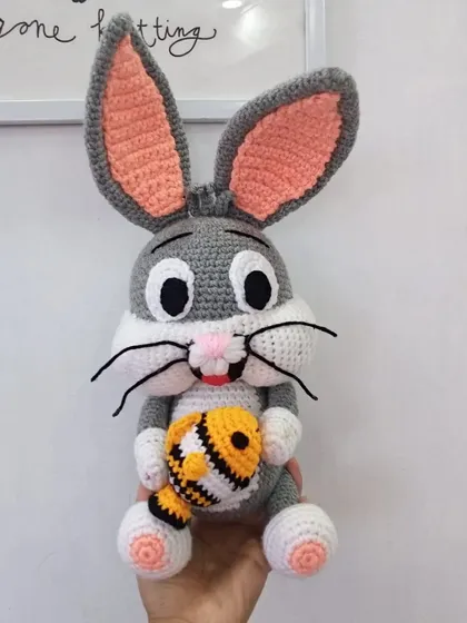 "What's up, doc?" Here is my crochet version of Bugs Bunny, complete with his long ears and a little fish accessory.
