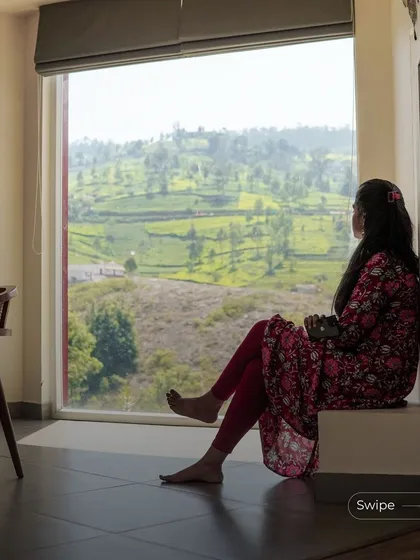 Good design respects its surroundings. At the Raghunath Farmhouse, I created this large picture window to frame the breathtaking views of the Kotagiri hills. The home is designed to feel like a part of the landscape, offering moments of quiet connection with the natural world outside.