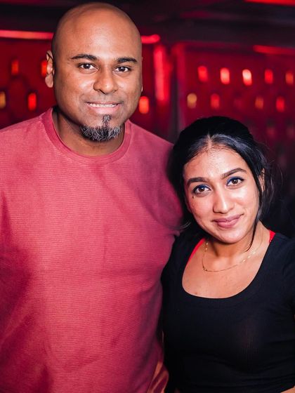 Posing with a guest.