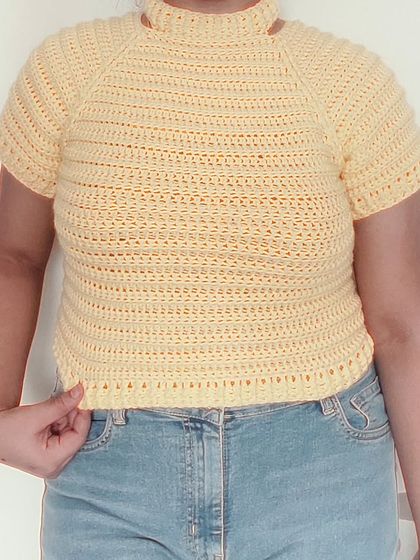 A clear front view of the Venus Sweater, showing the fit and the lovely texture created by the stitch pattern.
