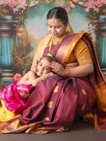 A quiet, loving moment as Yashoda cradles her little one. These portraits focus on the serene and gentle side of this divine mother-child relationship.