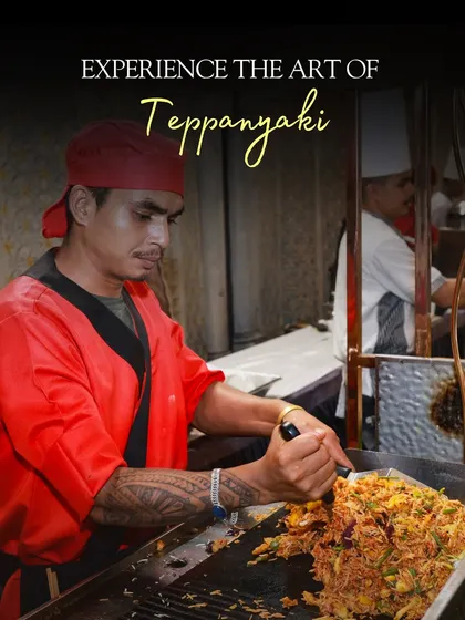 The sizzle of the teppanyaki grill is where the action is. My chef prepares Japanese-inspired dishes live, providing not just a meal but an engaging performance for your guests.
