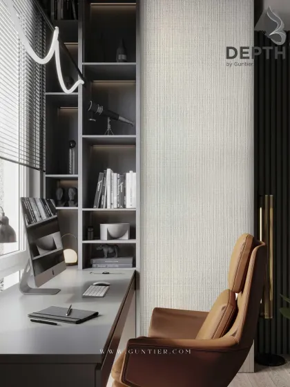 A home office featuring a light-colored, subtly textured veneer wall. It adds a sense of calm and focus to the workspace, proving that texture doesn't always have to be bold.