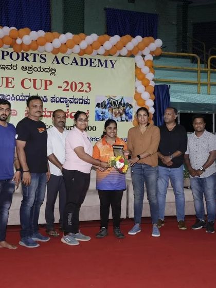 An award being presented to an outstanding player during the Unique Cup 2023 ceremony. We recognize individual excellence.