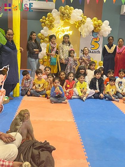 The kids were captivated by a special monkey show, a perfect and unique addition to the Ramayan-themed celebration.