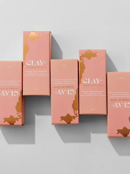 A clean and minimalist flat lay for Clay Co. This top-down grid style is perfect for e-commerce websites and catalogs, as it clearly showcases the entire product line against a simple, neutral background.