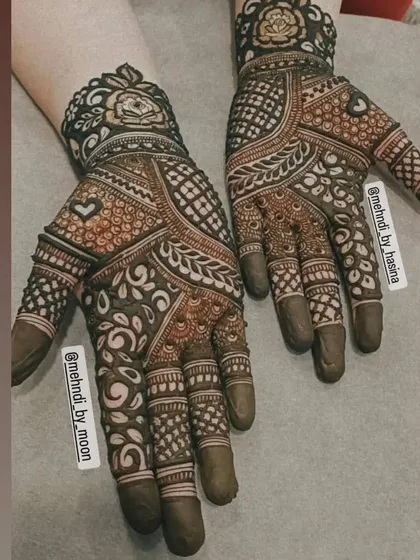 A classic Indian floral design that is perfect for any festive occasion. The combination of flowers, leaves, and checkerboard fills creates a full and traditional look.